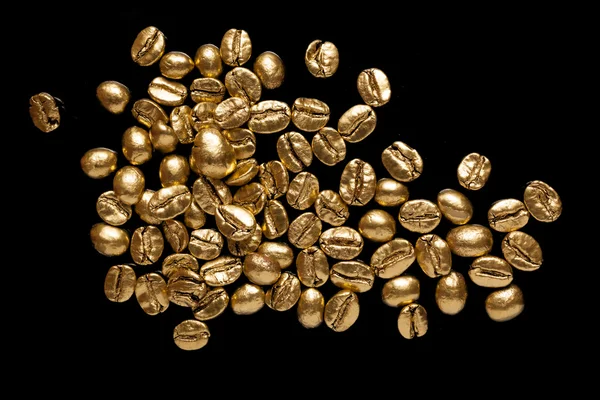 Golden cafe - coffee beans — Stock Photo, Image