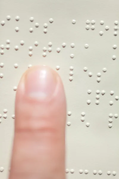 Blind reading text in braille language — Stock Photo, Image