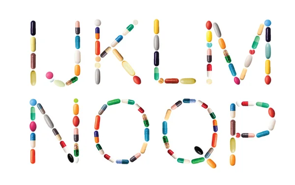 Alfabeto com pílulas — Fotografia de Stock