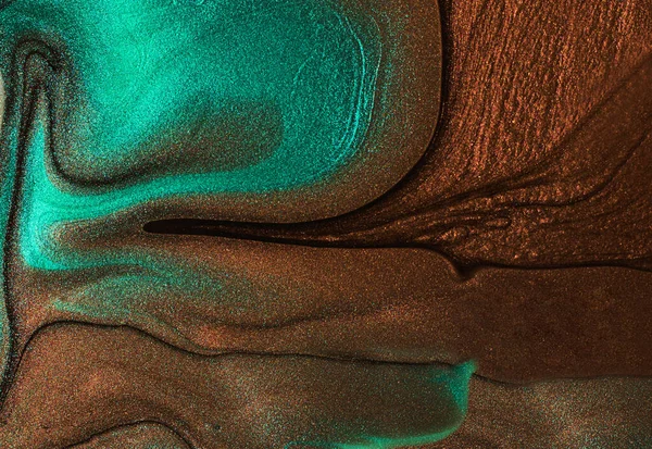 Abstraktní pozadí ze třpytivého laku na nehty, čokolády a tyrkysových barev. — Stock fotografie