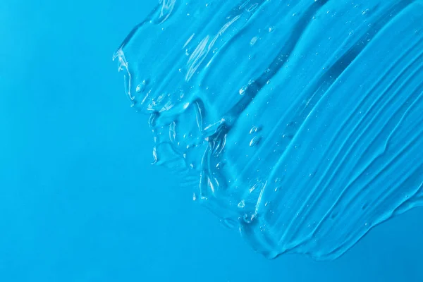 Kosmetyczny Żel Teksturowany Niebieskim Tle Kopiuj Miejsce Tekst Koncepcja Makiety — Zdjęcie stockowe