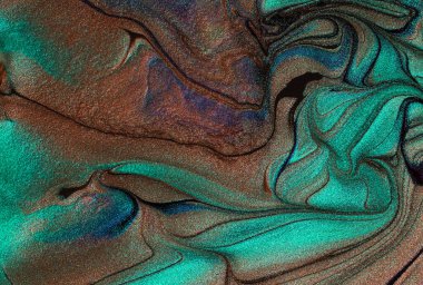 Işıldayan tırnak törpüsü, çikolata ve turkuaz renklerin soyut arkaplanı. Yatay yönelim..