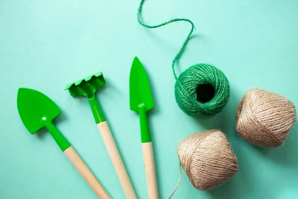 Top view of gardening tools and rope.House plant care concept. — Stock Photo, Image