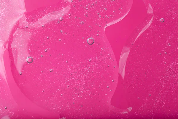 Draufsicht Auf Flüssiges Kosmetik Gel Mit Sprudelnder Struktur Auf Rosa — Stockfoto
