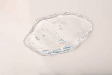 Sıvı kozmetik jelin kabarcıklı dokusuyla üst görünümü. Kozmetik modelleme kadar iyi..