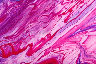 Lavender pink liquid background from nail polishes.Negative space for text or design.
