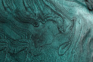 Elegant marble turquoise background,make from liquid nail polishes.Good as cosmetics backdrop.