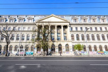 Bucharest, Romania, 6 November 2021: Main building of Bucharest University (Universitatea Bucuresti), hosting the Math, History and Business Administration Faculties, in a sunny autumn day