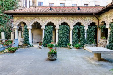 Bucharest, Romania, 20 November 2021: Interior court of the main historical building of Stavropoleos Monastery  Church (Biserica Stavropoleos) in the old city center in a sunny spring  day
