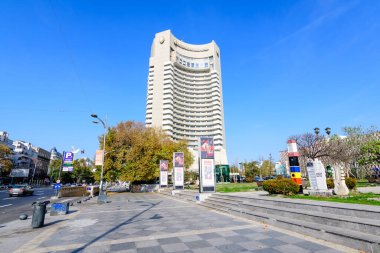 Bucharest, Romania,  6 November 2021: Tall building of InterContinental Hotel near the University Square (Piata Universitatii) in a sunny autumn day