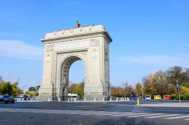 Bucharest, Romania - 6 November 2021:  Arcul de Triumf (The Arch Of Triumph) triumphal arch and landmark, located in the Northern part of the city on Kiseleff Road near King Michael I (Herastrau) Park