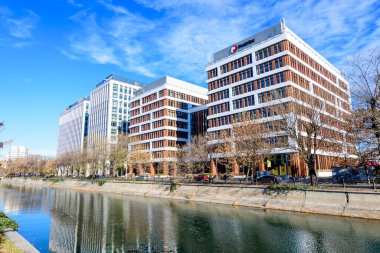 Bucharest, Romania, 20 Nov 2021: Modern glass business buildings at Timpuri Noi area with headquarters of Platika, Tremend, Zitec in a sunny autumn day