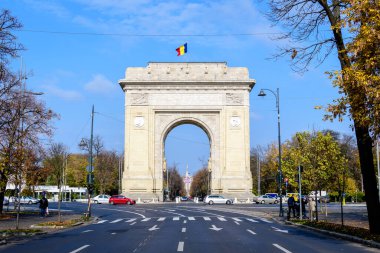 Bucharest, Romania - 6 November 2021:  Arcul de Triumf (The Arch Of Triumph) triumphal arch and landmark, located in the Northern part of the city on Kiseleff Road near King Michael I (Herastrau) Park