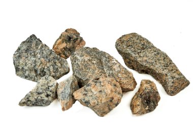 A bunch of textured stones on a white background.