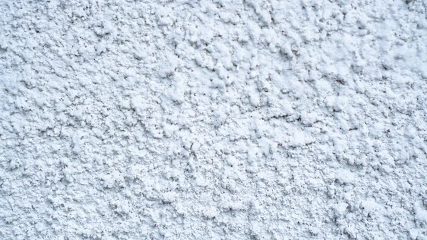 Intonaco esterno bianco strutturato. Struttura in gesso di cemento bianco. Costruzione facciata sfondo. Parete di stucco — Foto Stock