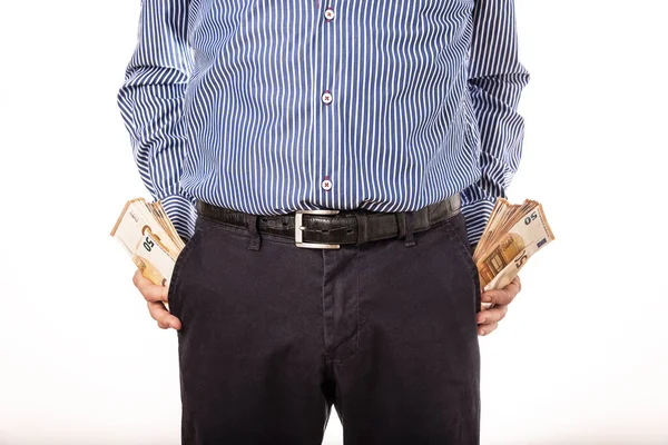 Hand with hundred euros and young men with money in the pocket. — Stock Photo, Image