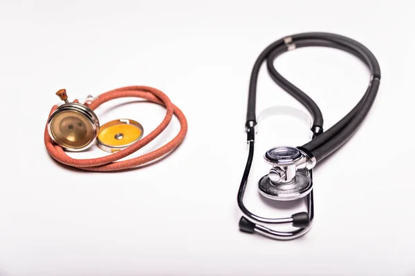 Two Old One Modern Stethoscope White Background — Foto de Stock