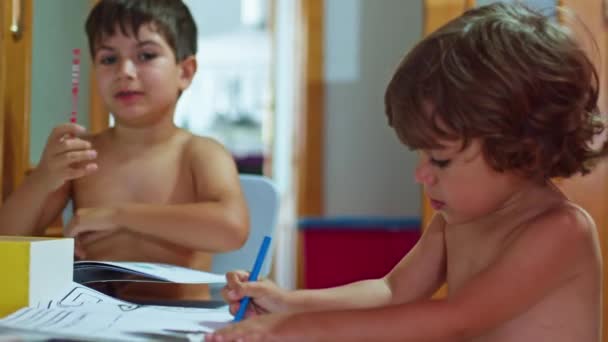 Two Kids Doing Homework Back Class Shirtless Because Heat — Stock video