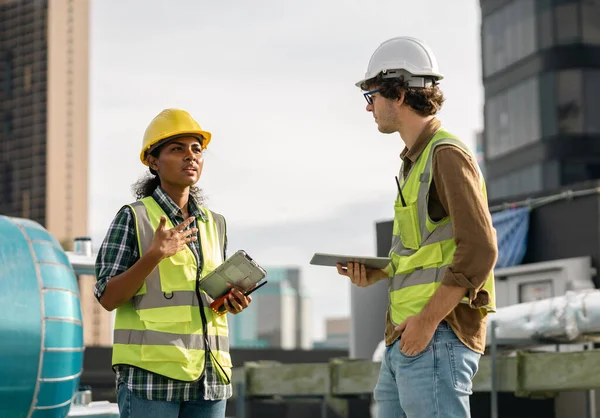 Two Professional Engineer Man Women Working Checking Maintenance Pipeline Construction Foto Stock