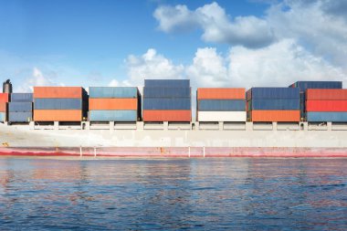Large cargo ship or vessel to carry cargo container and cruise, travel or float in sea, ocean. Freight transport industry for shipping, shipment, logistics. Global business for trade, import export.