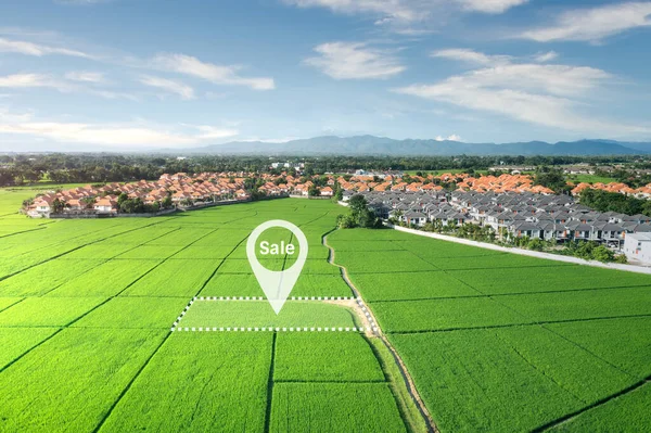 Land plot in aerial view. Real estate or property consist of empty land or green field and gps position pin point of location for development by housing construction, sale, rent, buy or investment.