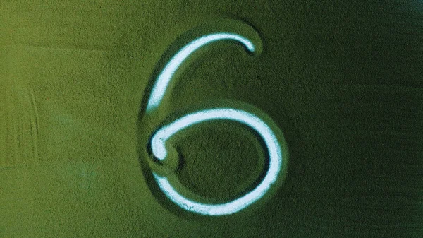 Hand Drawing Number Six Symbol Green Sand Male Hand Writes — Stock Photo, Image