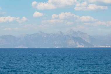 Panoramic view of Antalya Old City Harbor, Taurus Mountains and Mediterranean Sea