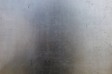 Pürüzsüz paslanmaz çelik yüzey. Dokulu arka plan. Tasarım için boş. Altında ya da altında. Metin için alanı kopyala