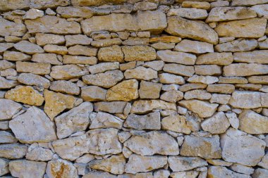 Eski antika antika taş duvar yüzeyi. Arkaplan