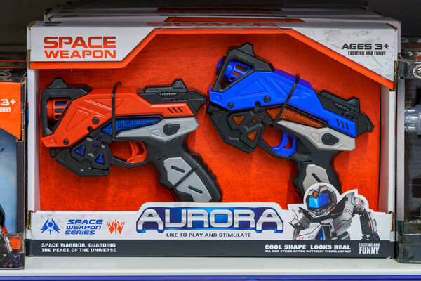 December 3, 2021 Balti Moldova. Illustrative editorial. A pistol on a supermarket shelf in the toy department