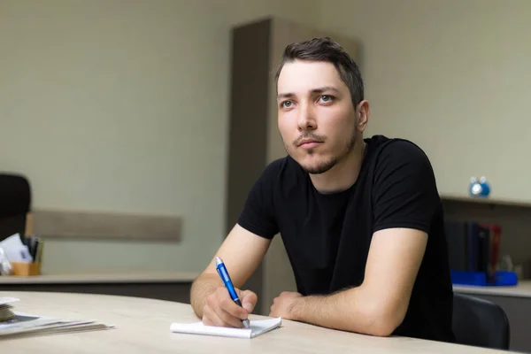 Serious Young Man Adult Guy Work Looks Directly Blurred Background — Stock Photo, Image