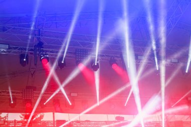 Metal trusses with colorful lights at the concert. Background with copy space for text or lettering