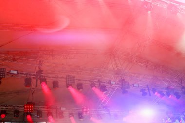 Metal trusses with colorful lights at the concert. Background with copy space for text or lettering