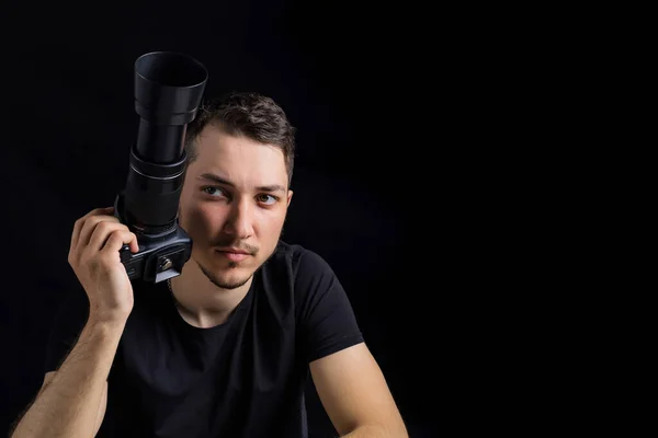 Young Handsome Man Black Clothes Camera Looks Straight Black Background — Stock Photo, Image