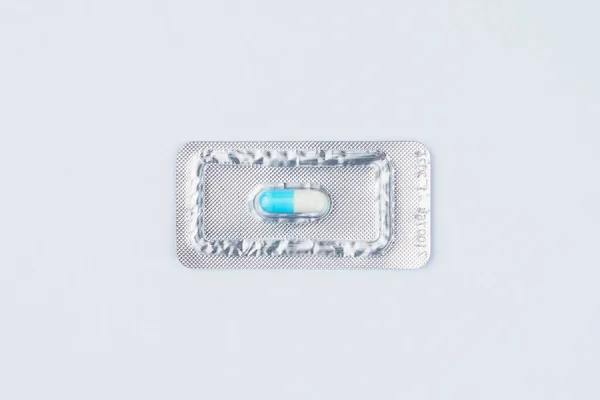 Blister Pack One Very Important Expensive Tablet Pill Light Background — Stock Photo, Image