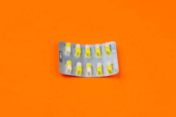 Blister Pack Ten Medical Tablets Pills Orange Background Selective Focus — Stock Photo, Image