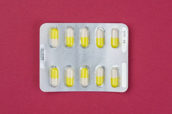 Blister Pack Ten Medical Tablets Pills Burgundy Background Medicine Pharmacology — Stockfoto