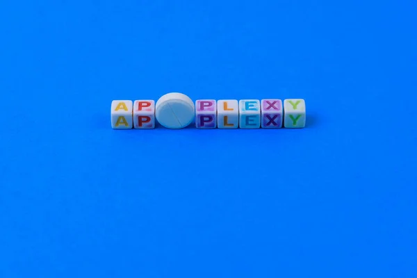 Apoplexy Text Aus Würfeln Eine Weiße Medizinische Pille Mit Einer — Stockfoto