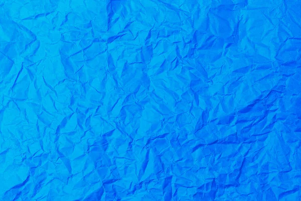 レトロな古いヴィンテージの古典的なグランジペーパーのラフなしわの質感の表面 背景や背景 設計は空白だ 純粋な青またはほとんど純粋な青 — ストック写真