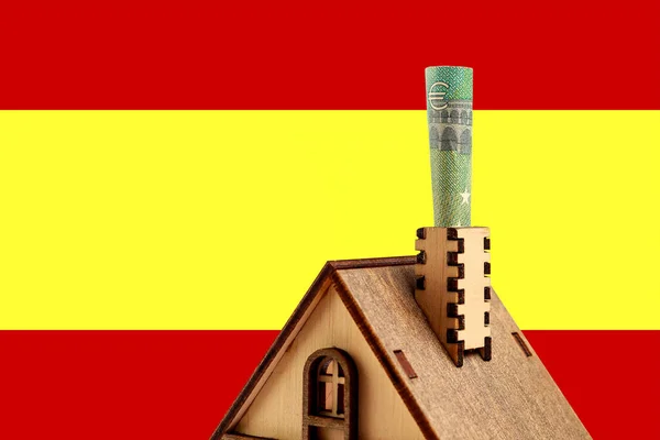 Euro Bill Chimney Wooden Toy Symbolic House Background Spain Flag — Stockfoto