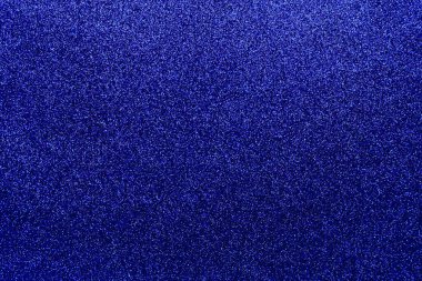 Işıltılı bir arka plan. Arkaplanda simler var. Parlak desenli yüzey. Çok koyu mavi. Yumuşak eğim ışığı