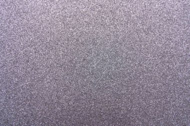 Işıltılı bir arka plan. Arkaplanda simler var. Parlak desenli yüzey. Koyu grimsi menekşe. Yumuşak eğim ışığı