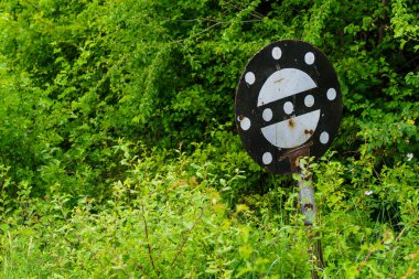 Railway sign the beginning or end of a dangerous place. Background with copy space for text