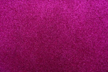 Işıltılı bir arka plan. Arkaplanda simler var. Parlak desenli yüzey. Koyu pembe. Yumuşak eğim ışığı