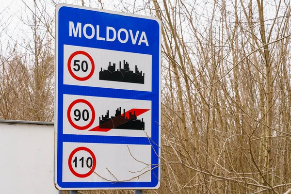 Road sign with speed limit and the inscription Moldova at the state border or customs. Background with selective focus and copy space for text