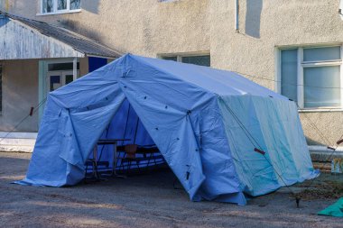 Field hospital medical tent for emergencies. Background with selective focus and copy space for text