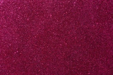 Işıltılı bir arka plan. Arkaplanda simler var. Parlak desenli yüzey. Koyu pembe. Karışık neon ışığı