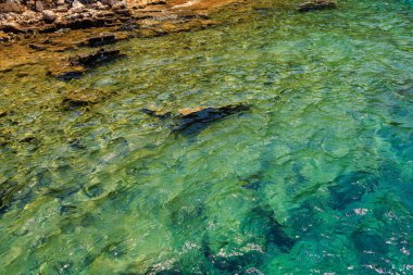 Kekova adasındaki batık şehir Karavola 'nın bir diğer adı, Türkiye' nin Demre ve Kas ilçelerinde Lycia 'nın merkezlerinden biri olan Antalya' da yer alan Lycian Dolichiste.