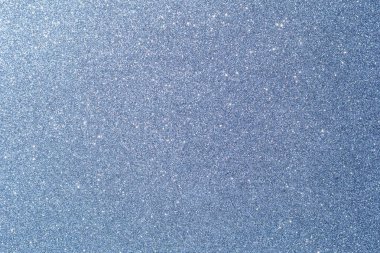 Işıltılı bir arka plan. Arkaplanda simler var. Parlak desenli yüzey. Çoğunlukla doymuş koyu mavi. Yumuşak ışık