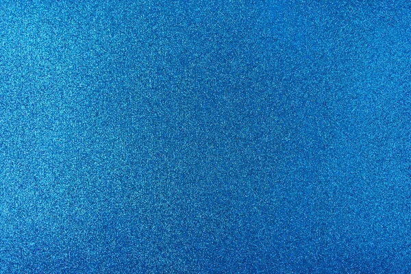 キラキラの背景 キラキラした背景 光沢のある質感の表面 強い青 柔らかい光 — ストック写真